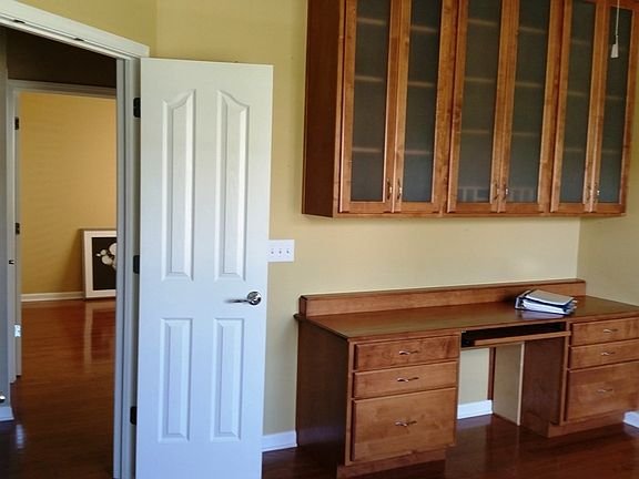 Den off Foyer, built-in desk and cabinet