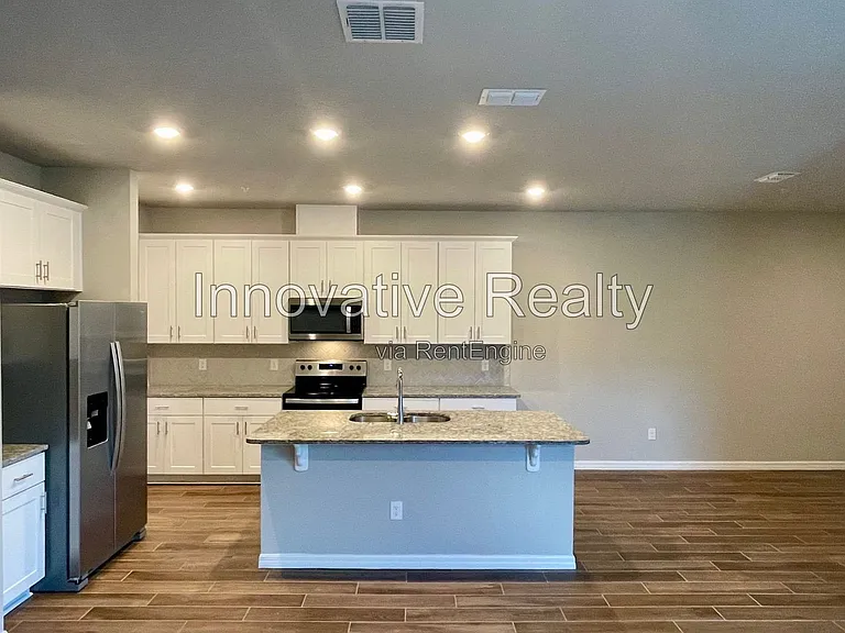 1016 Legacy Winds Way — Photo 4