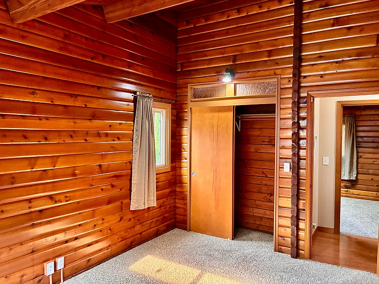 Bedroom Two with closet and room has two windows for natural light.