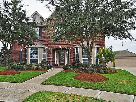 Built in 2006 with over 3600 sqft and a 3 car detached garage with a large driveway. Full gutters an