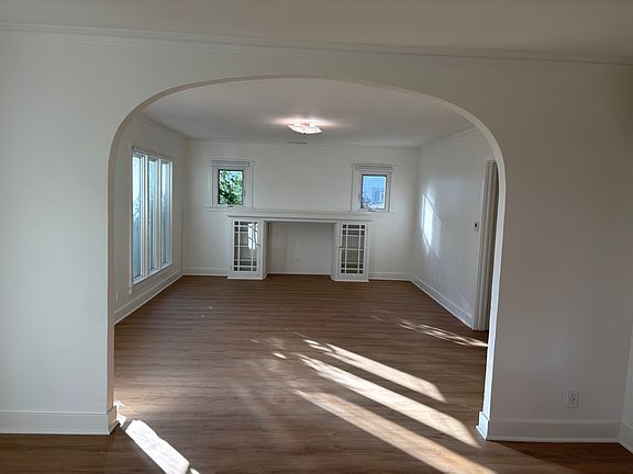 Living room. Entrance on the left just beyond the arch.