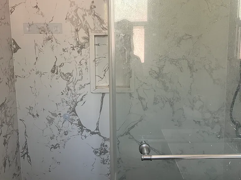 Granite shower and Glass sliding door