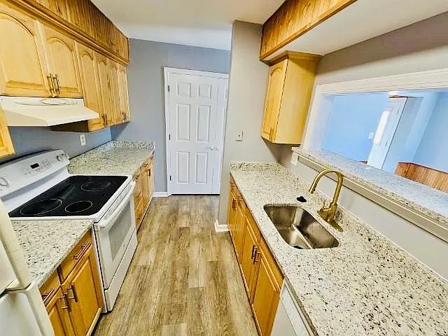 Kitchen w/ new Granite counters, new sink, new appliances (Stainless steel appliances - coming)