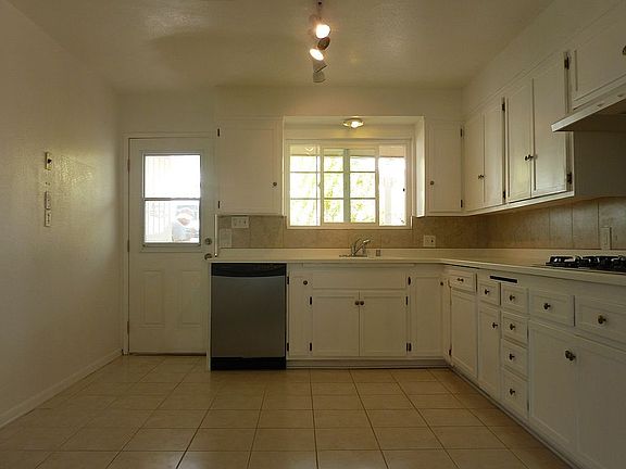 Kitchen w/Door out to Patio