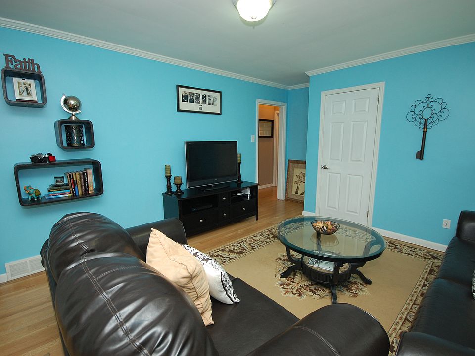 Open living room with beautiful hardwood flooring. 