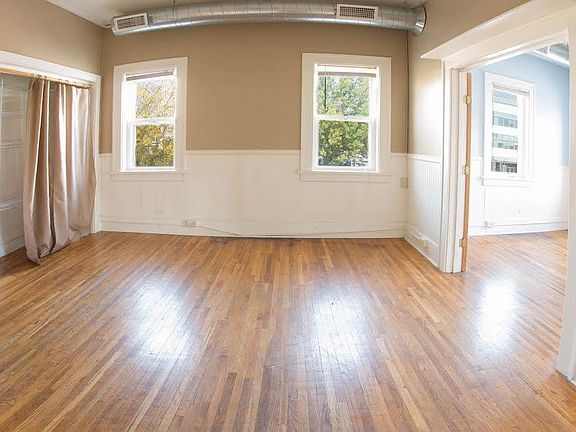 The main living area faces north, looking across Iowa Avenue