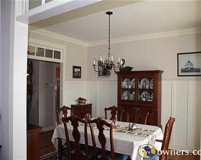 Dining room (12' x 13'4") from foyer.  Note transom windows.