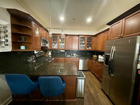Full fledged Kitchen with rich Brookside cabinetry