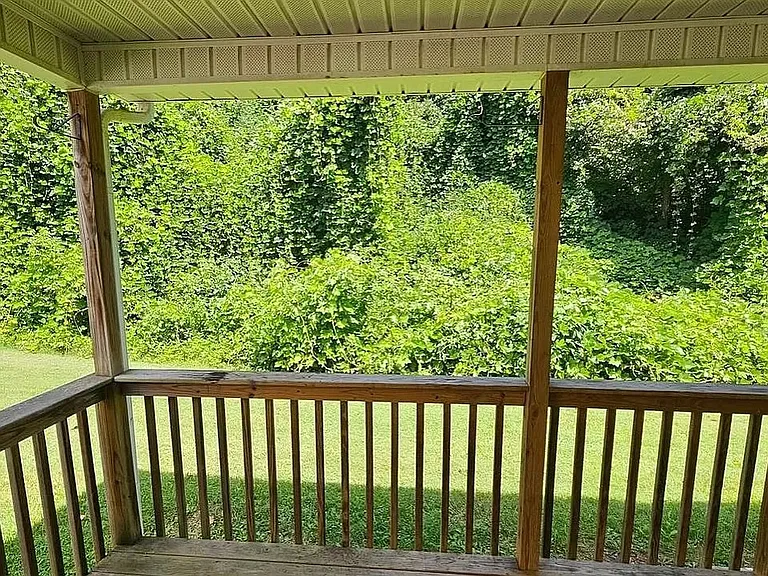 Covered patio with storage room