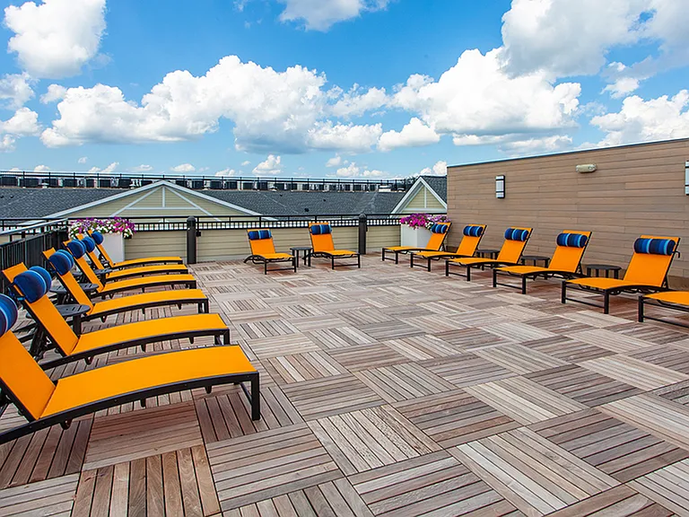 Lounge around on this rooftop social space