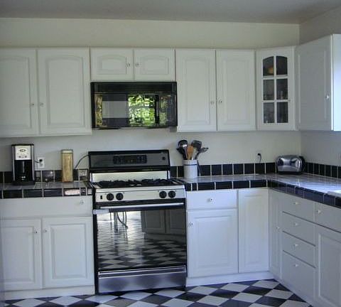 Large kitchen with breakfast area, lots of cabinets and plenty of counter spc.