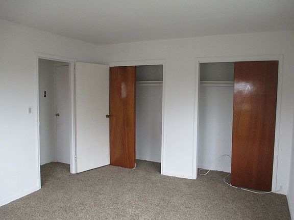 Bedroom with double closets