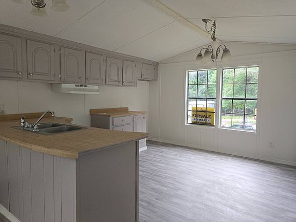 2nd image of 1421 Cody Rd N Lot 28