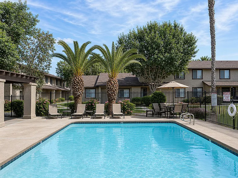 Camelot Apartments Pool and Exterior Photo in Yuma AZ