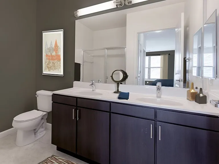 Classic Package bath with white laminate countertops and espresso cabinetry