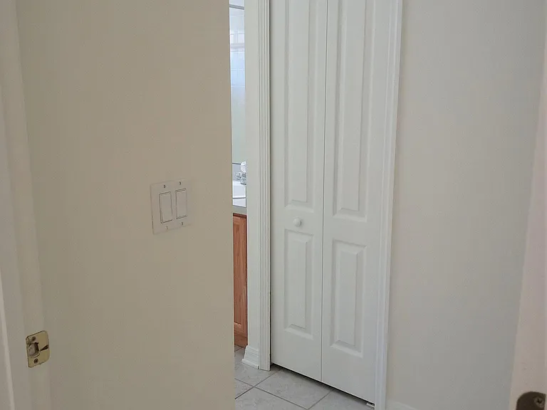 Guest bath view to the closet.