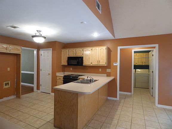 Kitchen w/breakfast bar MICROWAVE, STOVE, DISHWASHER INCLUDE