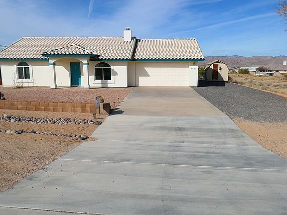 Full driveway and RV parking