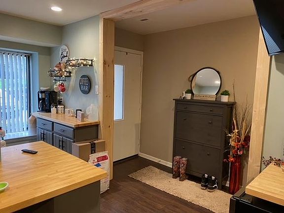 Entry way/kitchen with coffee bar, and shoe storage cabinet