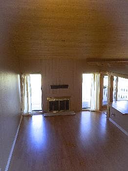 LR w/ wood vaulted ceiling 