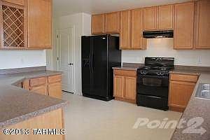 Kitchen w/ Built-In Decorative Wine Rack