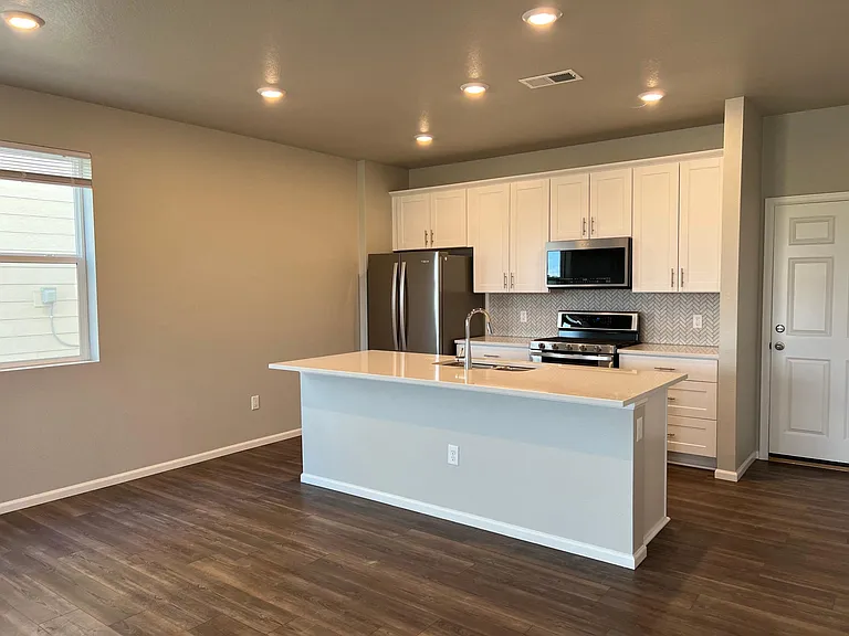 Kitchen with stainless steel appliances