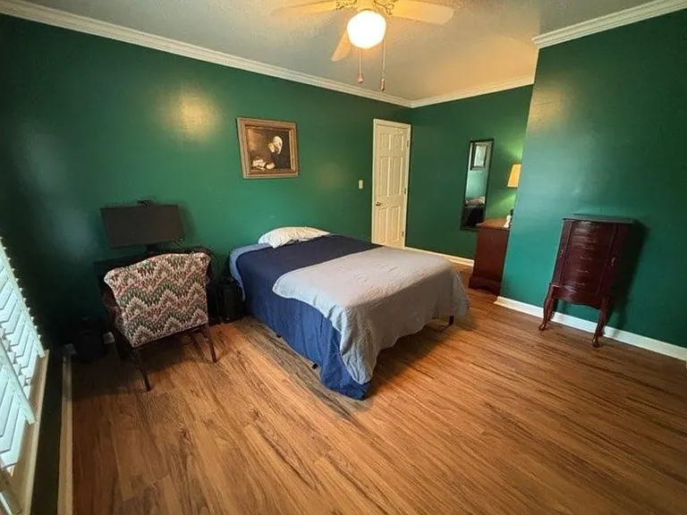 Large second bedroom with double closets and new luxury vinyl plank floor