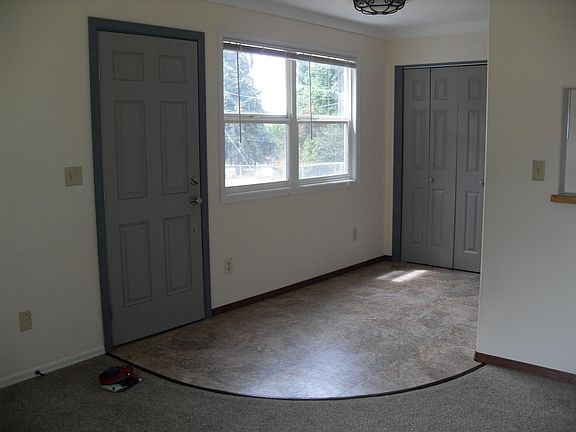 Entry & dining.  Laundry closet.
