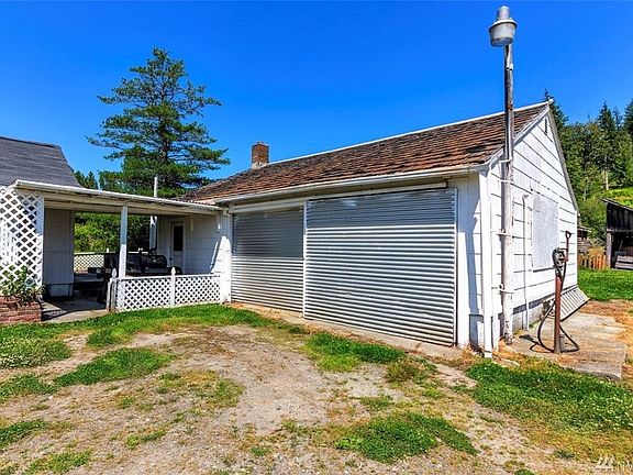 Garage off home has extra storage and a large cool room which could be used for canning.