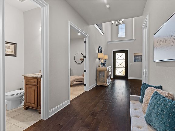 Showing placement of powder bath & double door flex-entertainment room.