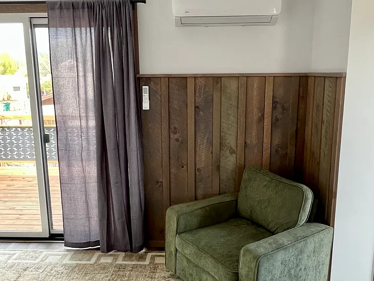 Efficient mini spilt keeps the studio warm and cool. There's also a large overhead fan.