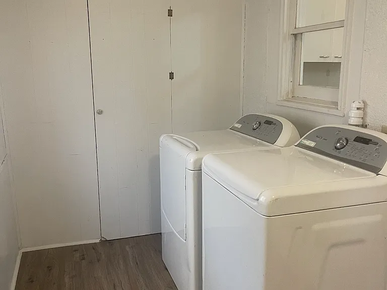 Back porch. Lots of storage. Washer/dryer