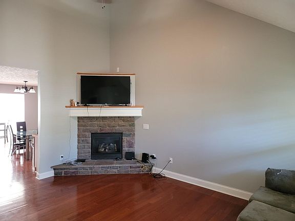 Vaulted family room with direct vent fireplace.