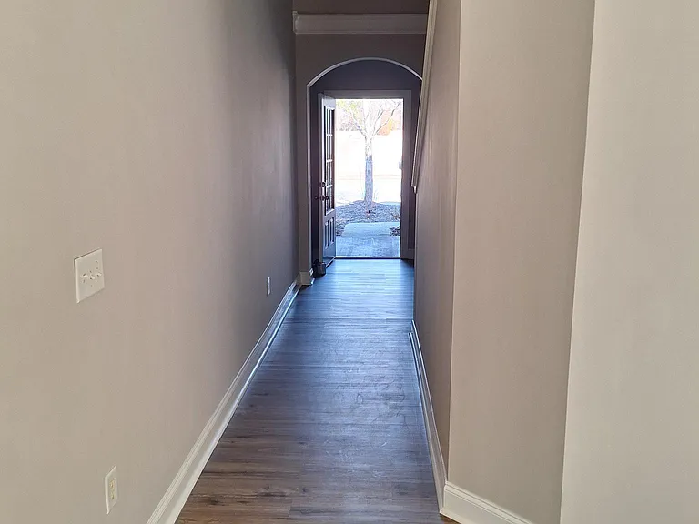 Hallway from family room to the front door