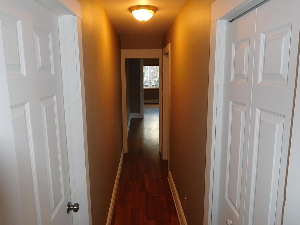 Hallway to bedrooms and bathroom.