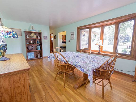Large dining room with lots of natural light.
