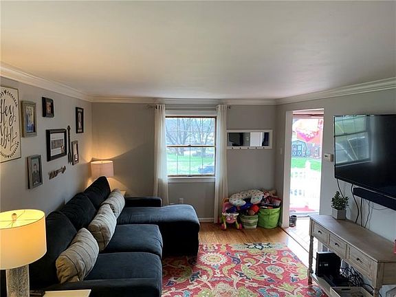 Beautiful hardwood floors with neutral paint make this room great for entertaining!