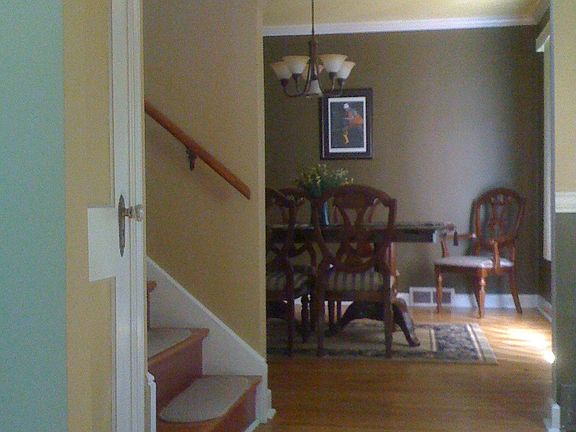 Classic arched entries into dining and living rooms.