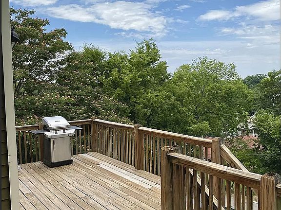 Every day is perfect for grilling and savoring the view from this home.