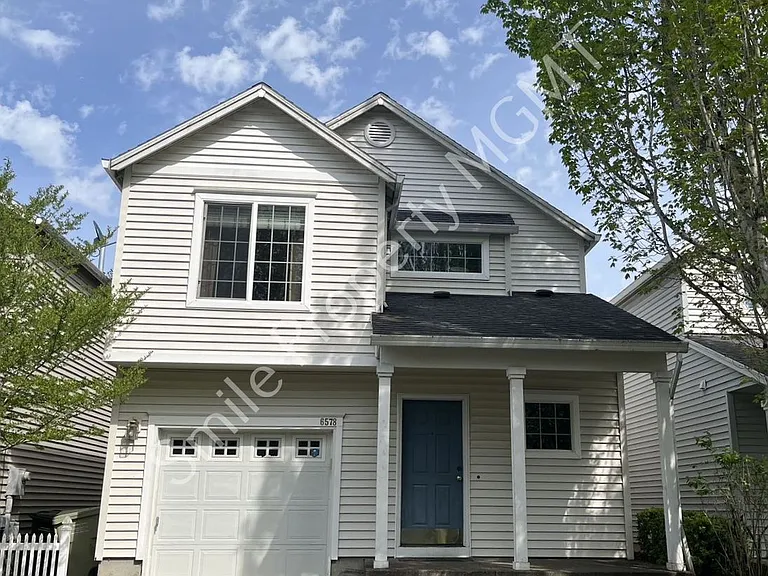 6578 NW Wenmarie Dr — Photo 1