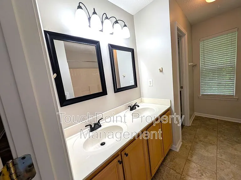 7603 Lullwater Cv — Photo 16