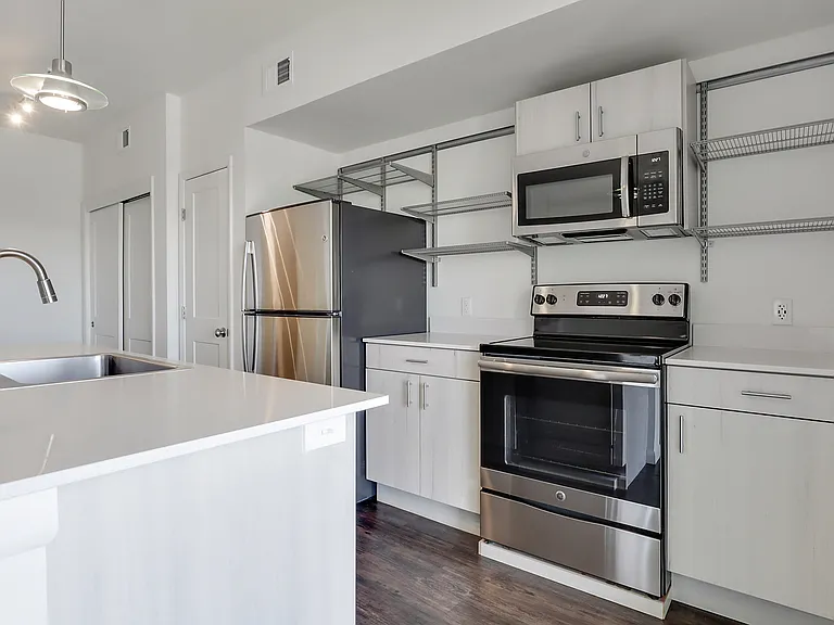 312 Pictured, 314 (top floor) has flipped/mirror floorplan, same fixtures & finishes