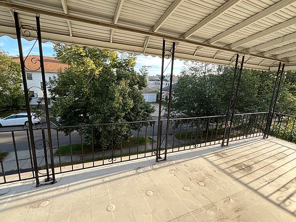 Huge balcony overlooking the quiet street, perfect for summer days