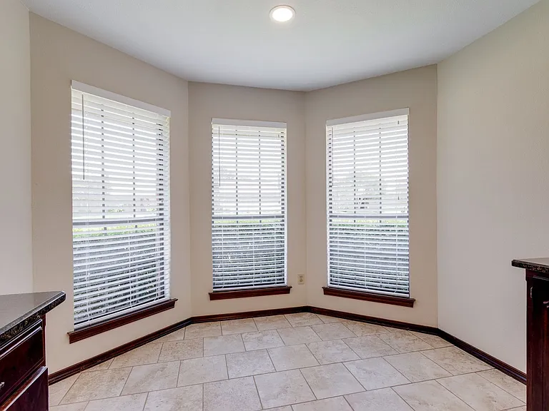 Put a large round table here with a nice view of the front.