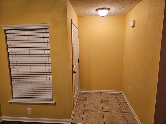 3rd image of 6925 Ortega Woods Dr Unit 12