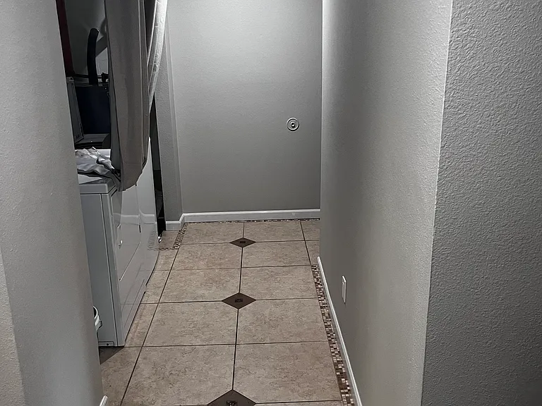 Entry towards the front door (right around corner)