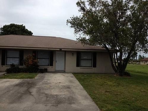 Exterior of Duplex - Fresh Paint Coming Soon!