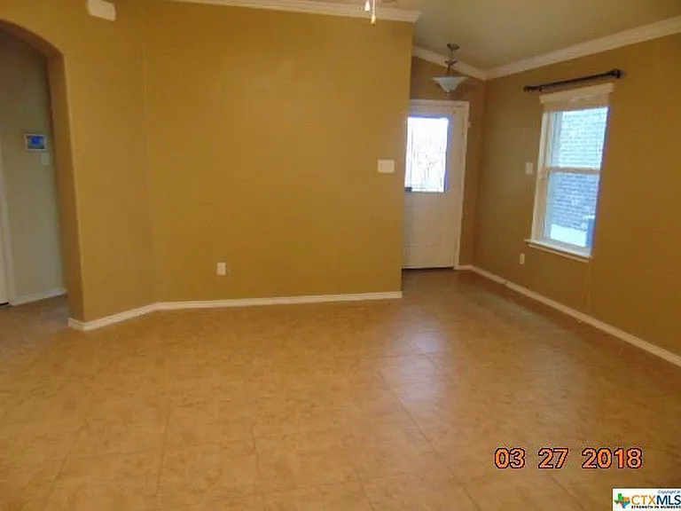 living room view from kitchen entry way