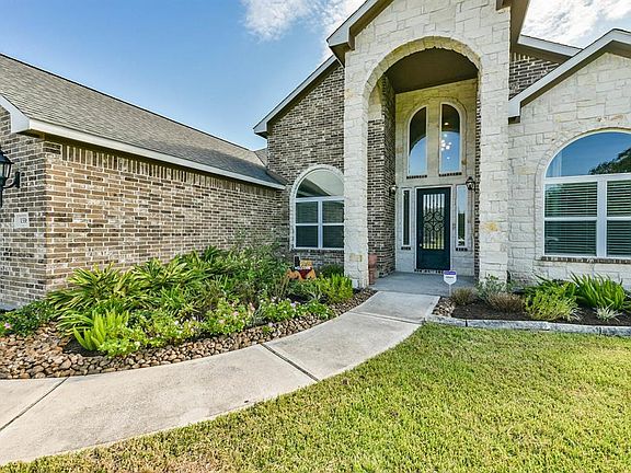 Gorgeous 10 ft iron door greets you as you enter this home.