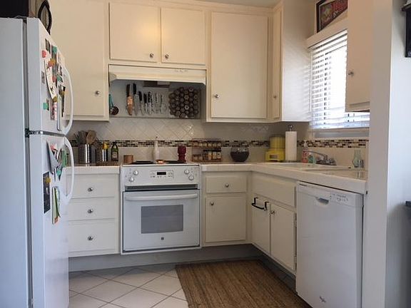 Kitchen with stove refrigerator and dishwasher